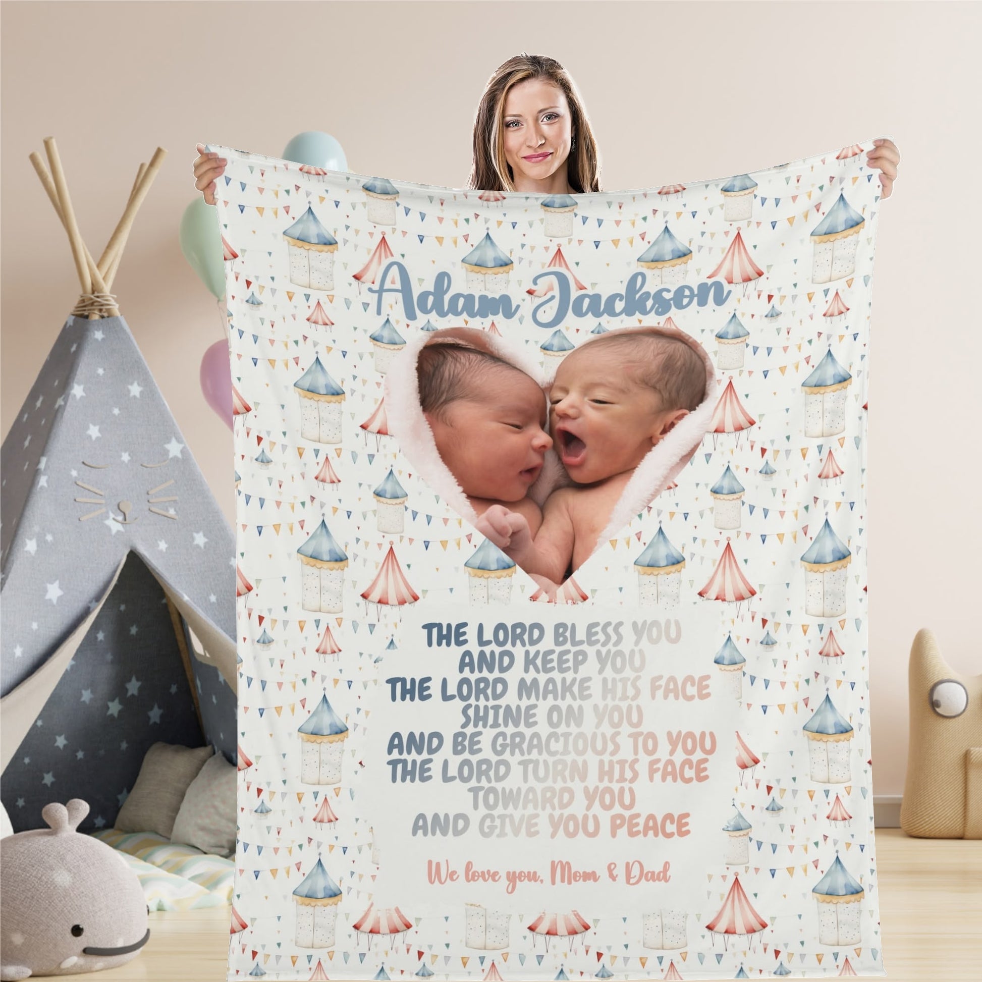 A woman cradles a Personalized Baby Name Blanket, featuring two newborns inside a heart shape. The Bible verse, "The Lord bless you and keep you...," is surrounded by pastel castle graphics, with the personalized text reading, "Adam Jackson.