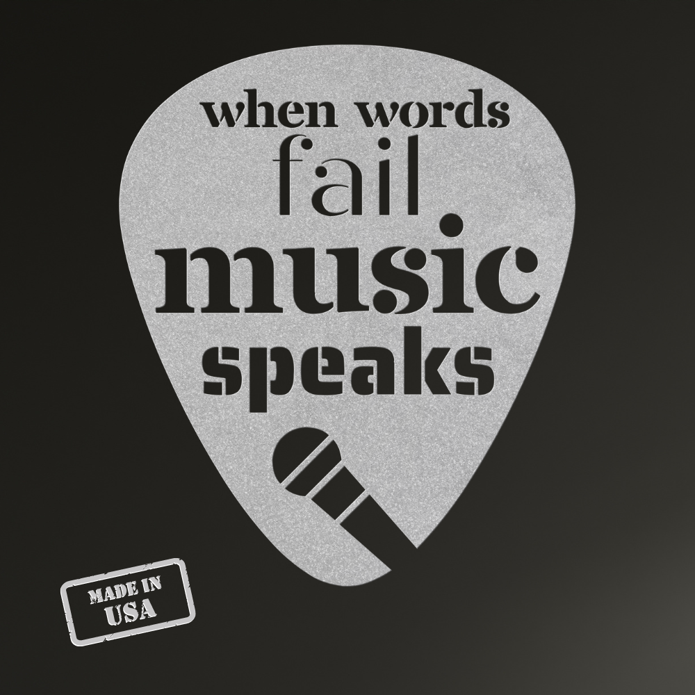 Introducing the "When Words Fail Music Speaks | Mic," a gray guitar pick adorned with the phrase "when words fail music speaks" in bold black lettering. It features a stylish black microphone icon at the base and proudly displays a "Made in USA" stamp in the corner. This elegant piece, set against its sleek black background, is ideal for enhancing any home decor.