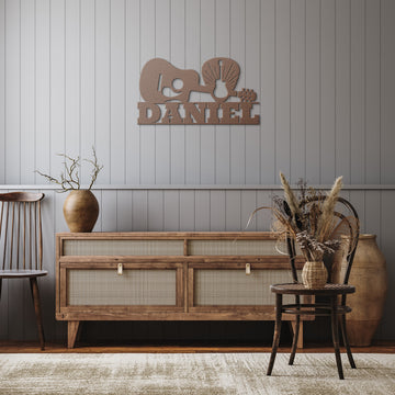 Cozy corner of a modern living room featuring a wooden sideboard with cane webbing doors, complemented by stylish decorative vases and a Acoustic Guitar Wall Sign Custom Name | Custom Metal Wall Art above it.