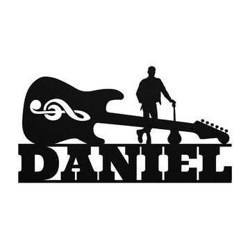 A silhouette of a guitarist with a cane stands on an electric guitar featuring a treble clef. "DANIEL" appears in bold below, making this Electric Guitar with Guitarist Wall Sign Custom Name unique metal wall art.