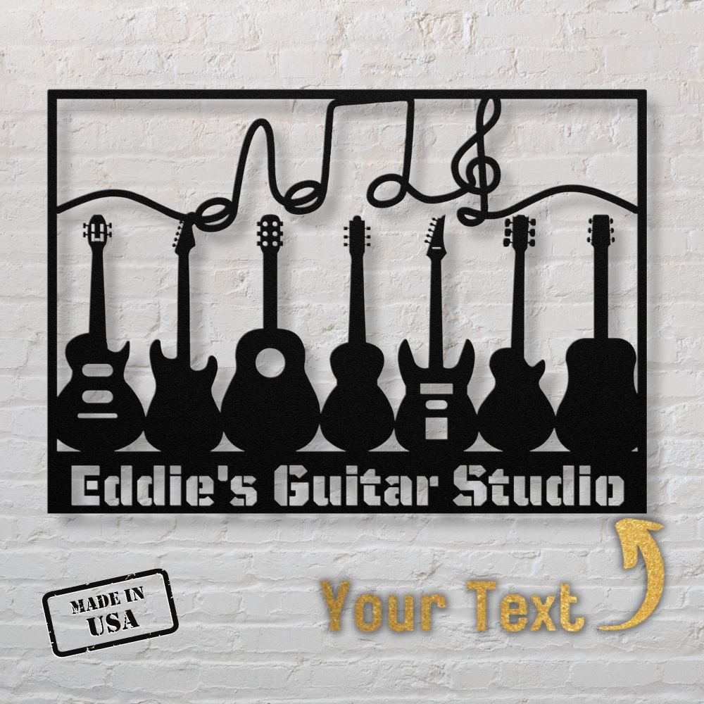 The Multiple Guitars Wall Sign with Music Notes and Custom Text is a powder-coated 18-gauge steel sign with six guitar silhouettes, a musical note, "Eddie's Guitar Studio," a "Made in USA" stamp, and custom text on a white brick wall background.