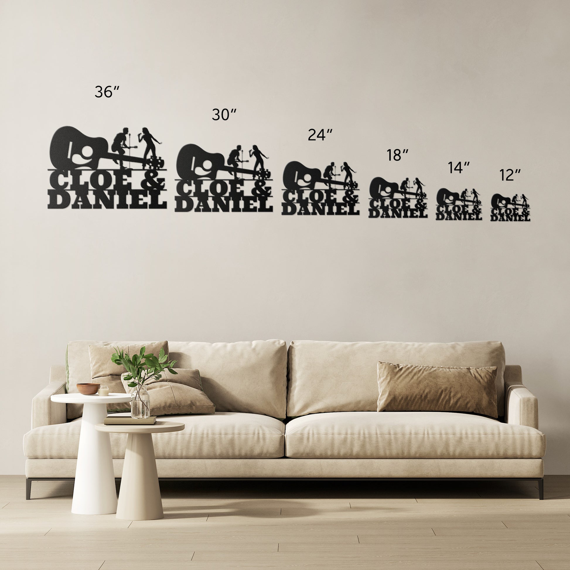 A beige sofa sits by a light wall adorned with six Singer & Guitarist Wall Sign with Custom Name metal art pieces (sizes: 36", 30", 24", 18", 14", and 12"), adding musical flair, while a round coffee table completes the decor.