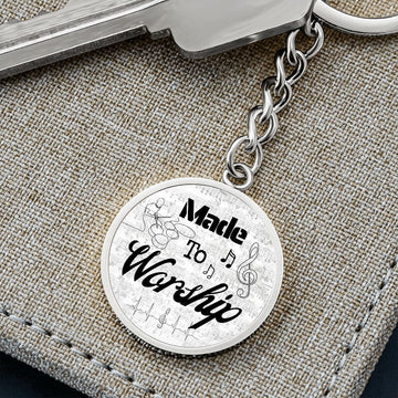 The "Made to Worship Silver Sheet Music" keychain features drums and engraved wordsβperfect as a unique gift for drummers and musicians.
