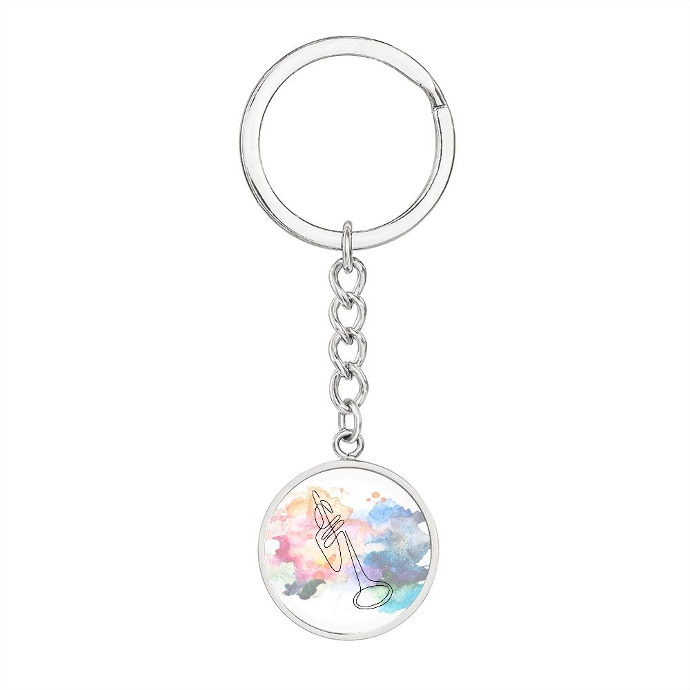 The Trumpet Colorful Circle Pendant Keychain features a metal ring and a vibrant trumpet design—the perfect personalized gift for trumpetists and music lovers.