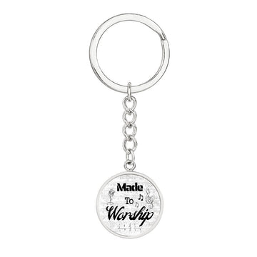 The "Made to Worship Silver Sheet Music" keychain features a round pendant with musical notes and "Made to Worship" in black—a perfect personalized gift for singers and music lovers.