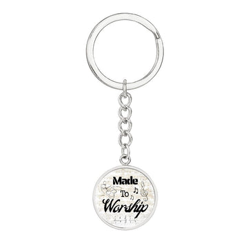 A gold keychain for drummers featuring "Made to Worship" and sheet music—an ideal personalized gift for music lovers.