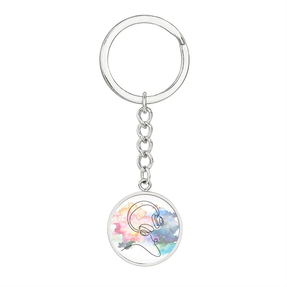 The Head Phones Colorful Circle Pendant Keychain features a vibrant design—an ideal gift for music lovers seeking a unique, stylish accessory.