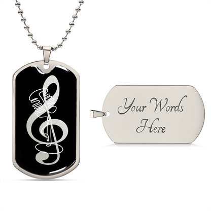 A black dog tag necklace features a G-clef cutout design on one side and a vintage microphone motif; the reverse side, shown separately, displays the engraved text "Your Words Here," highlighting that this personalized dog tag can be customized to create a truly unique gift.