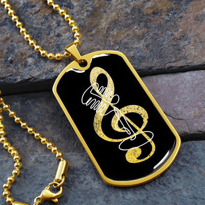 The Dog Tag Necklace Black features a G-clef cutout and vintage mic design on a distressed pendant, making it an ideal personalized gift for music lovers.